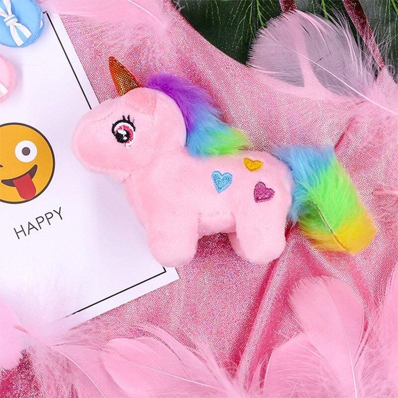 Doudou Licorne blanc et pendentif