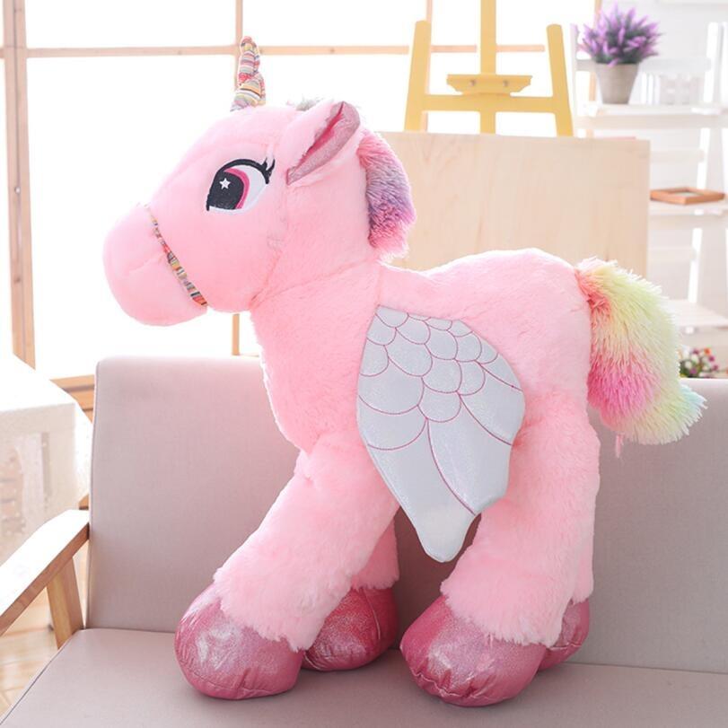 Peluche Licorne magique dans une chambre