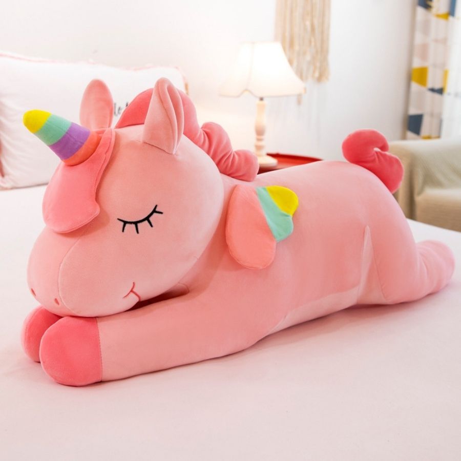 Sourire de la Peluche Licorne Géante